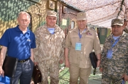 Слева направо: Советник Секретариата ОДКБ Владимир Булатов, заместитель командующего ВДВ России по миротворческим операциям и применению КСОР (зам.руководителя учения "Взаимодействие-2014" по ВС РФ) генерал-майор Александр Вязников, начальник Объединенного штаба ОДКБ генерал-лейтенант Александр Студеникин, первый заместитель Главнокомандующего Сухопутными войсками Республики Казахстан генерал-майор Алдабергенов у входа на командный пункт КСОР.