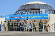 Генеральный секретарь ОДКБ выступает на митинге после завершения активной фазы учения "Взаимодействие-2014"